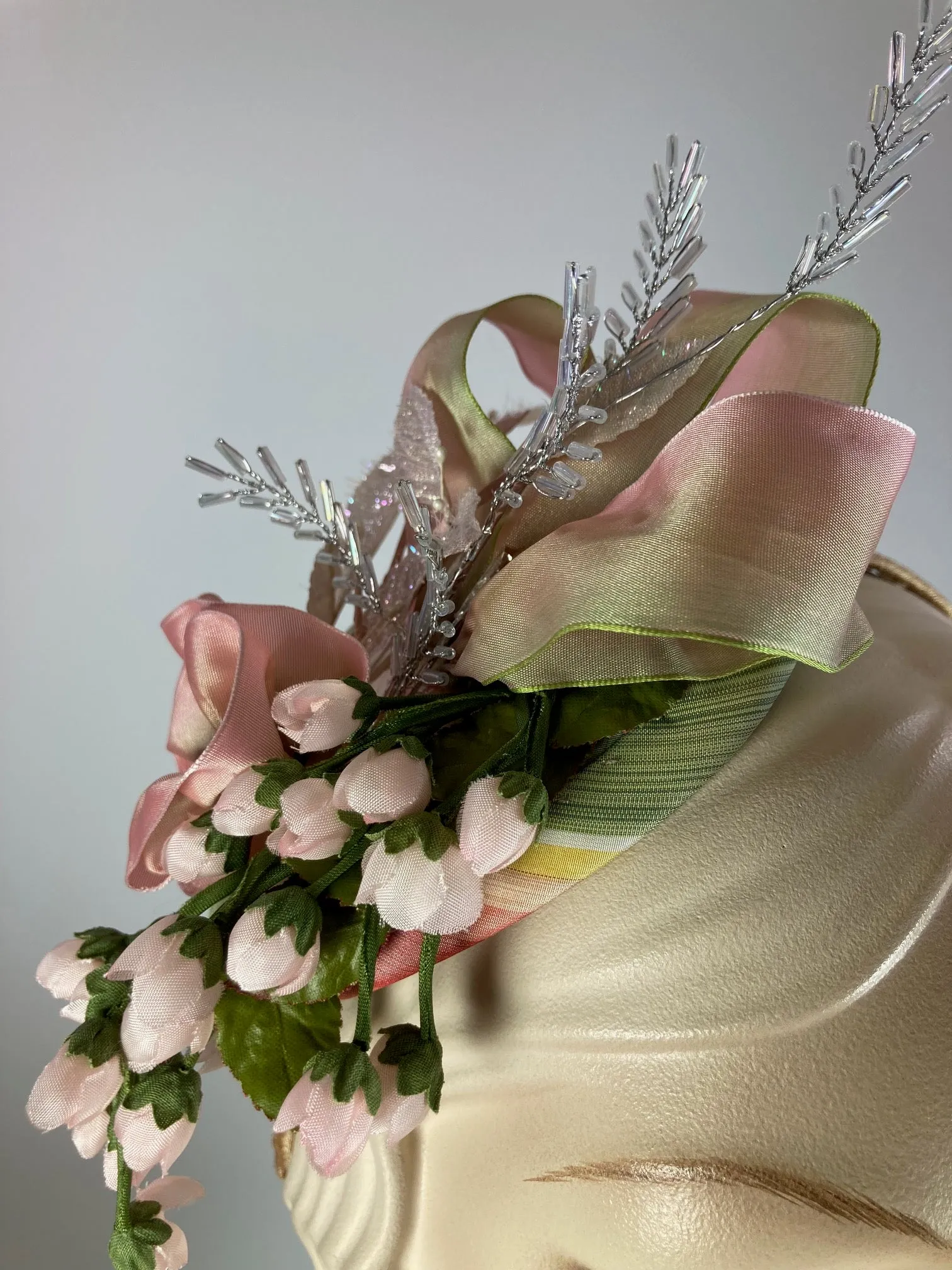 Fancy fascinator hat for women. Small cocktail hat. Soft pink and green Derby Oaks hat. Tea party headpiece. Small scale Headband fascinator