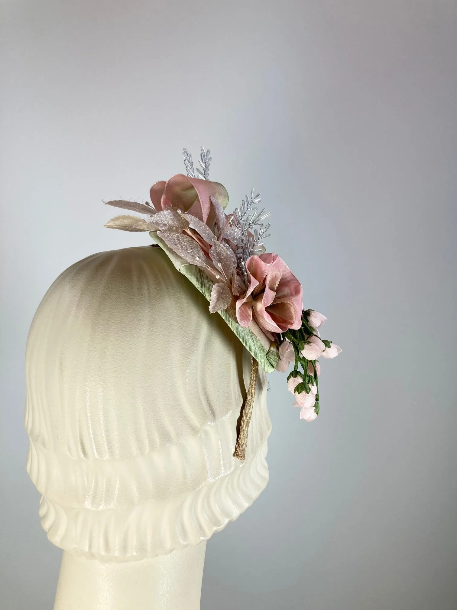 Fancy fascinator hat for women. Small cocktail hat. Soft pink and green Derby Oaks hat. Tea party headpiece. Small scale Headband fascinator