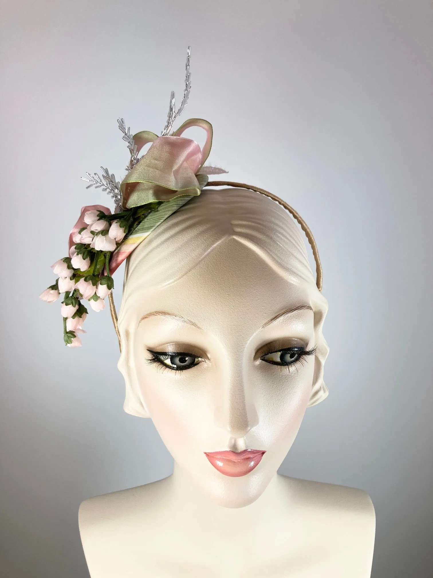 Fancy fascinator hat for women. Small cocktail hat. Soft pink and green Derby Oaks hat. Tea party headpiece. Small scale Headband fascinator